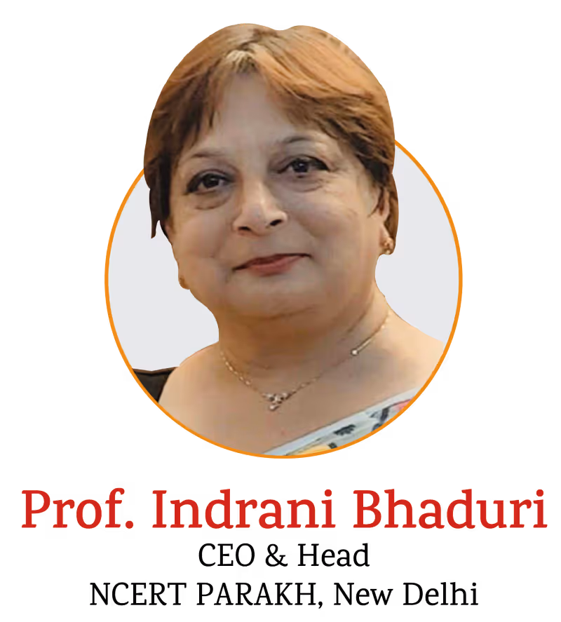 Portrait of a middle-aged woman with short brown hair, wearing a necklace and light-colored saree, identified as Prof. Indrani Bhaduri.
